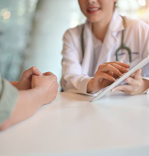 Patient and doctor talking during consultation